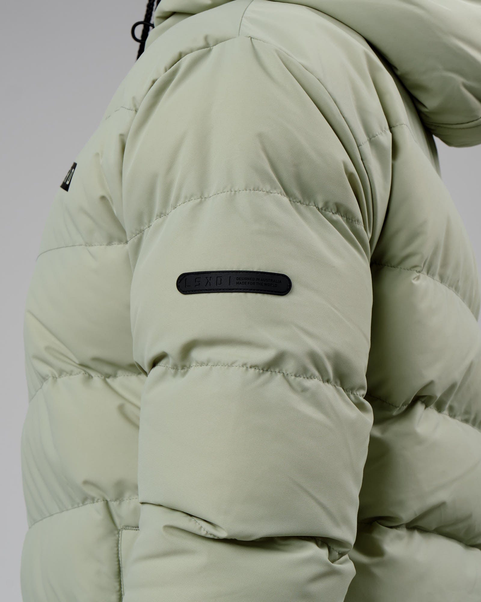 Model wearing Roasted Puffer Jacket 22 - Desert Sage