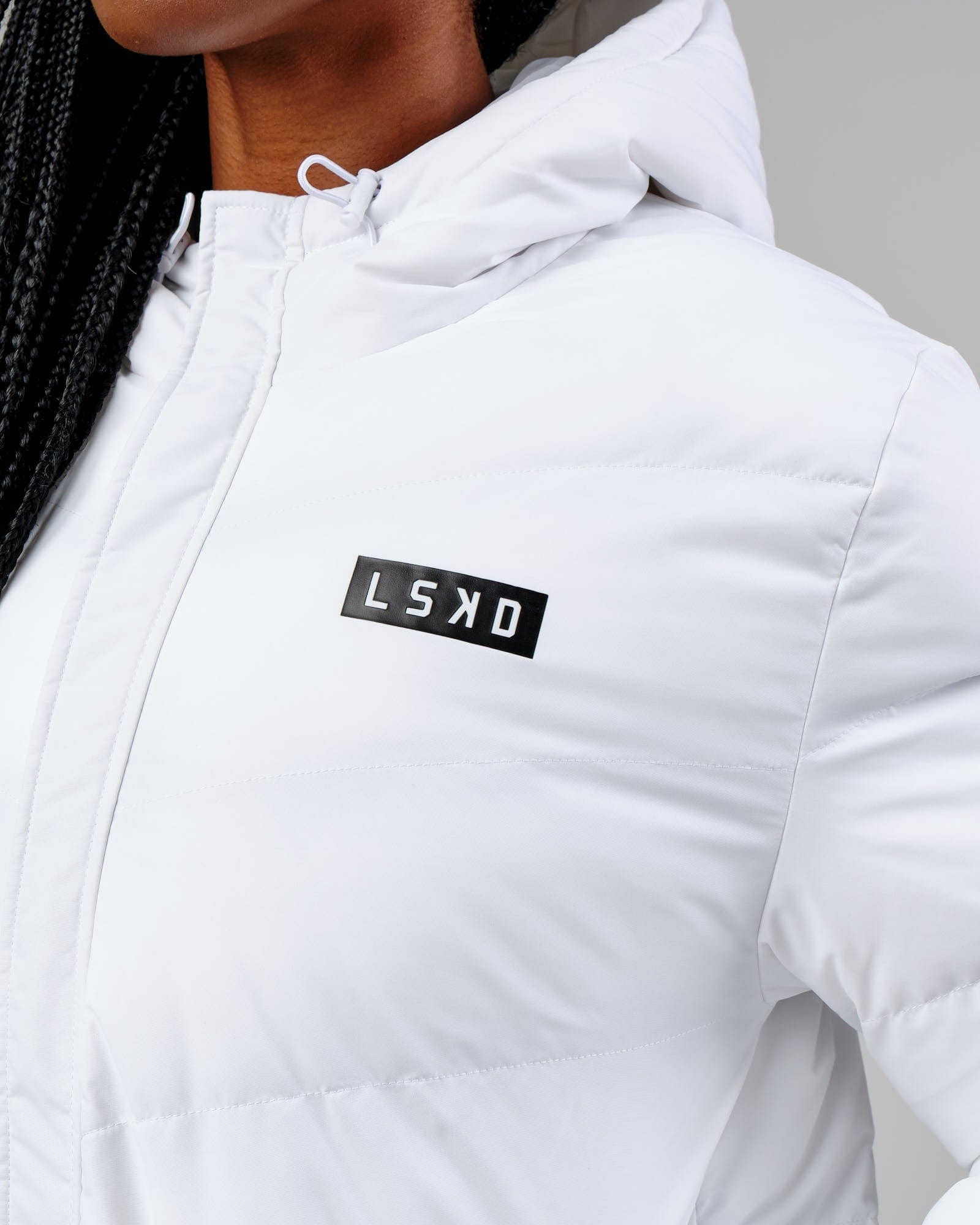 Model wearing Roasted Puffer Jacket 22 - White