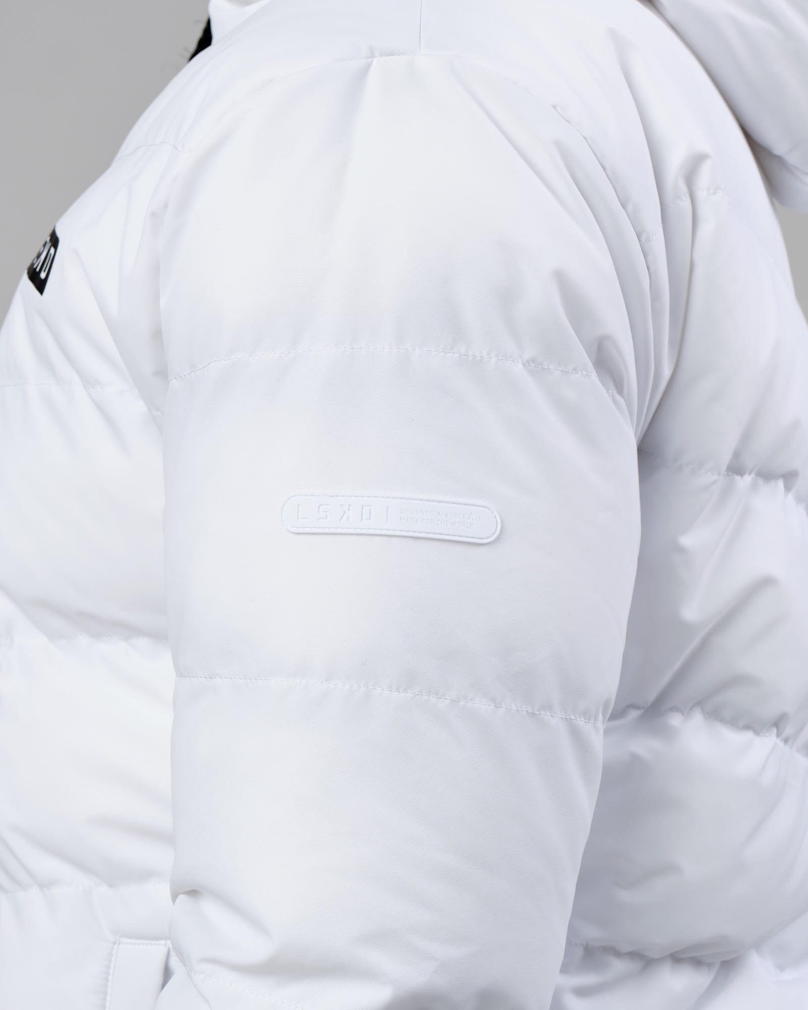 Model wearing Roasted Puffer Jacket 22 - White
