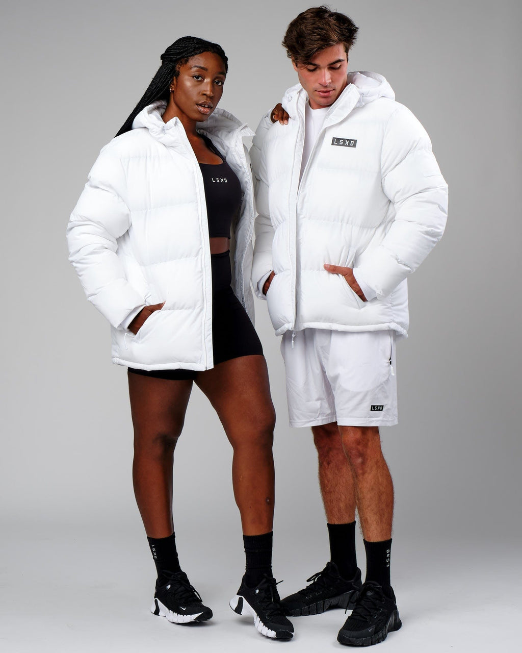 Model wearing Unisex Roasted Puffer Jacket Oversize 22 - White