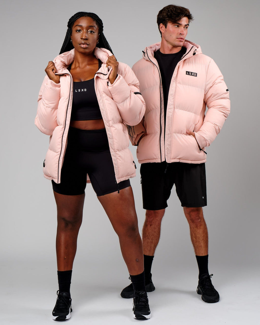 Model wearing Unisex Roasted Puffer Jacket Oversize 22 - Peach Whip