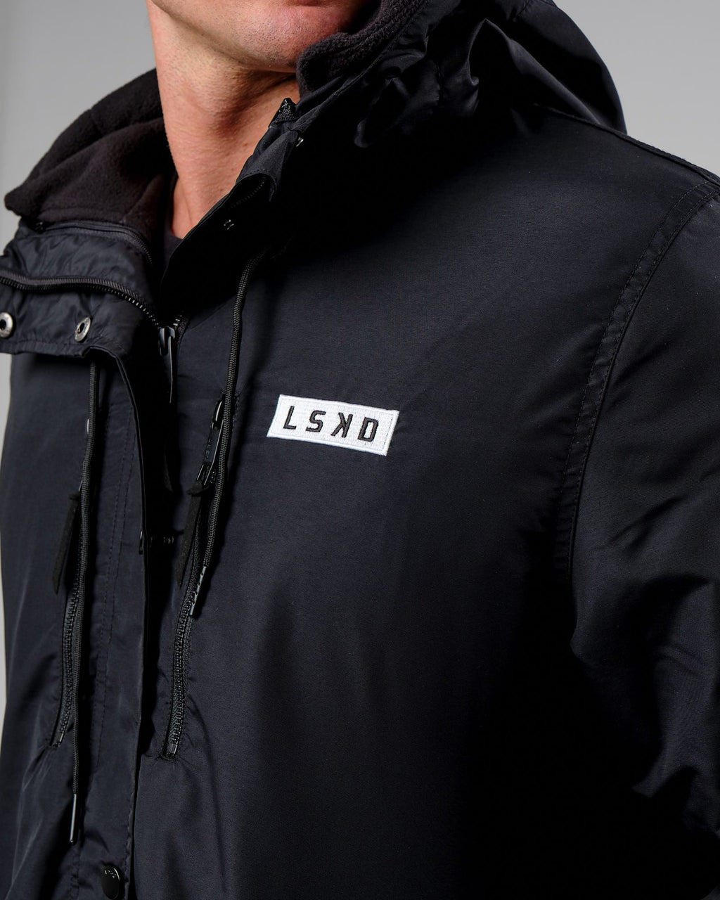Model wearing Tack Anorak Jacket - Black