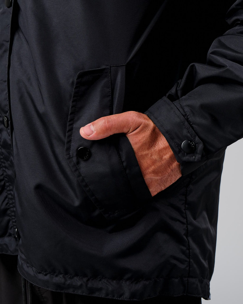 Model wearing Tack Anorak Jacket - Black