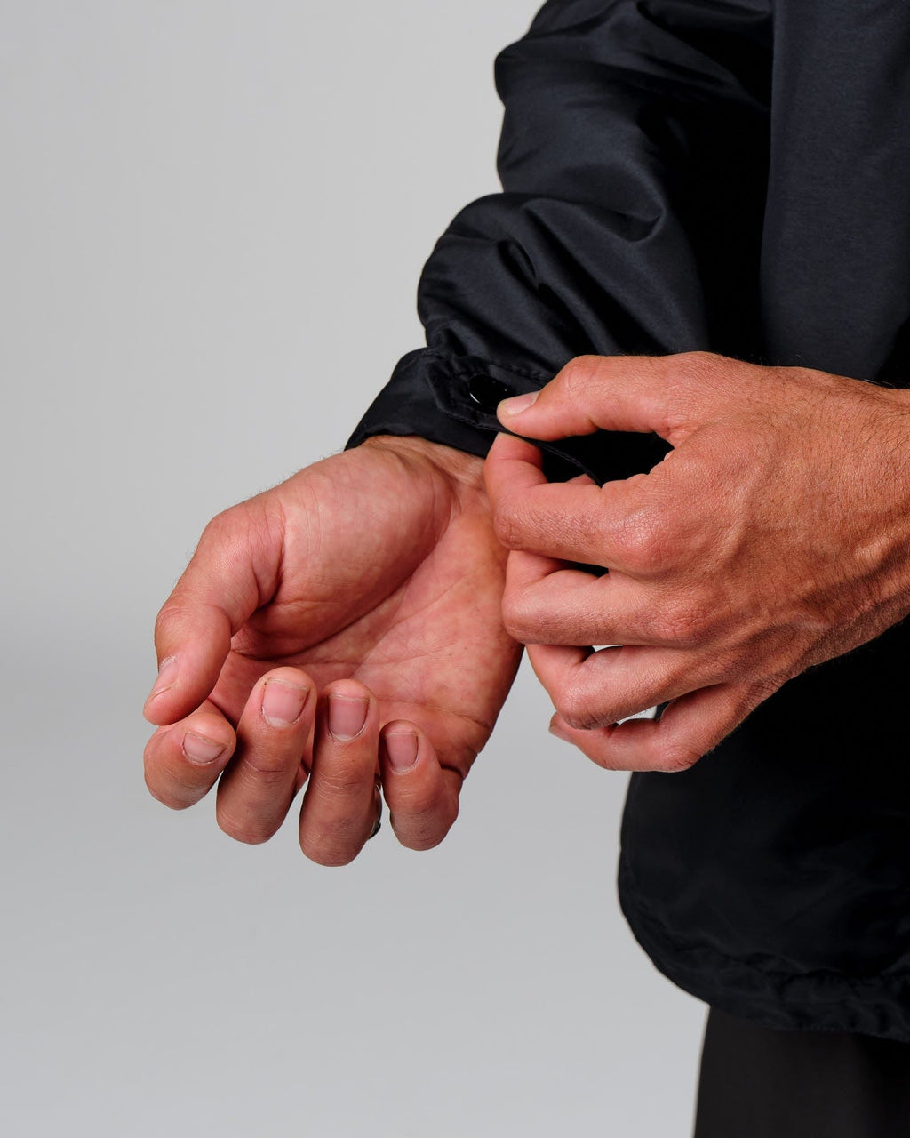 Model wearing Unisex Tack Anorak Jacket - Black