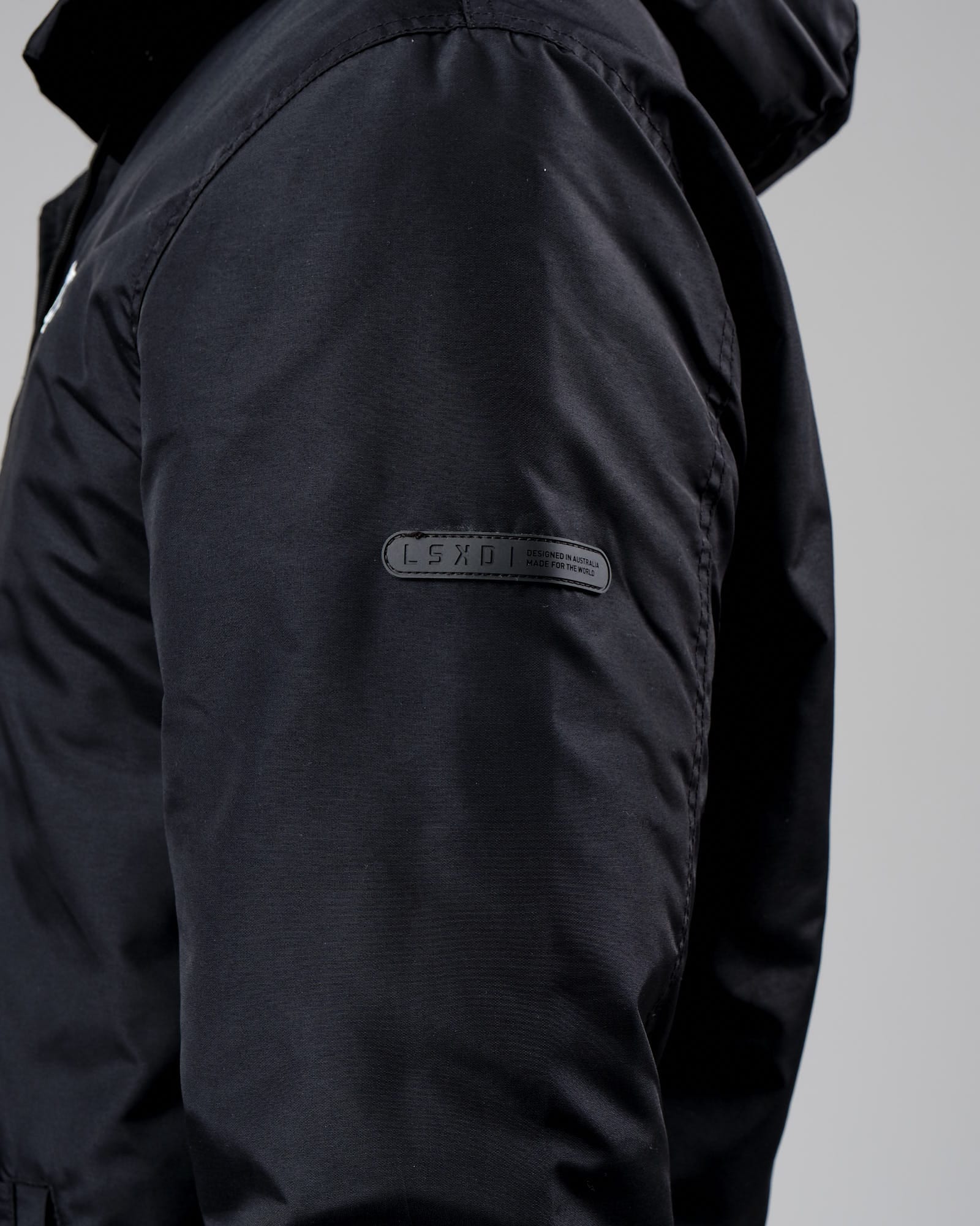 Model wearing Tack Anorak Jacket - Black