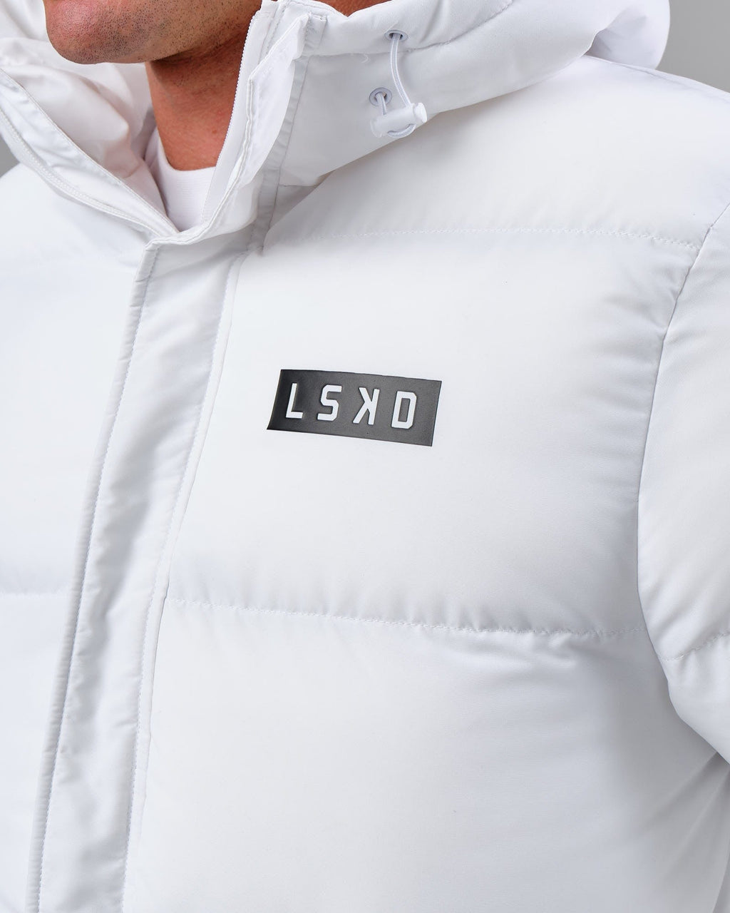 Model wearing Unisex Roasted Puffer Jacket Oversize 22 - White