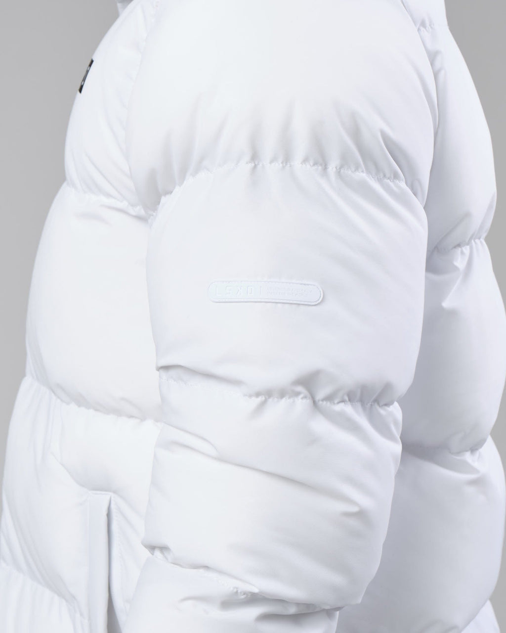 Model wearing Unisex Roasted Puffer Jacket Oversize 22 - White
