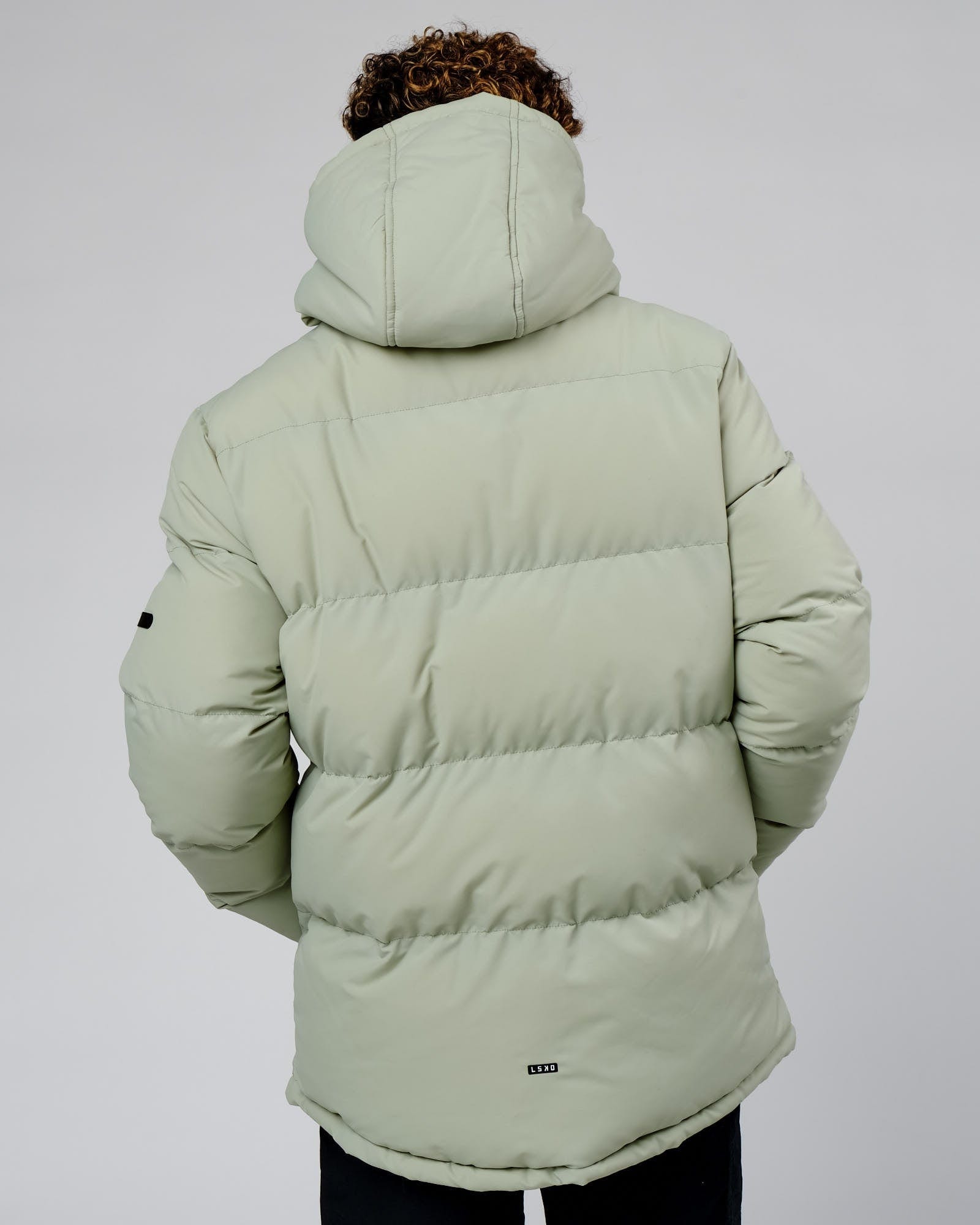 Model wearing Roasted Puffer Jacket Oversize 22 - Desert Sage