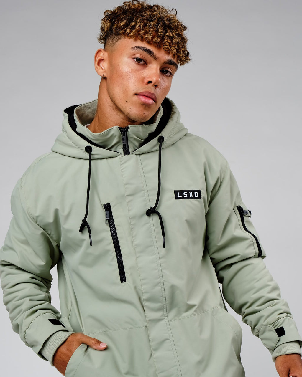 Model wearing Marshall Jacket - Desert Sage