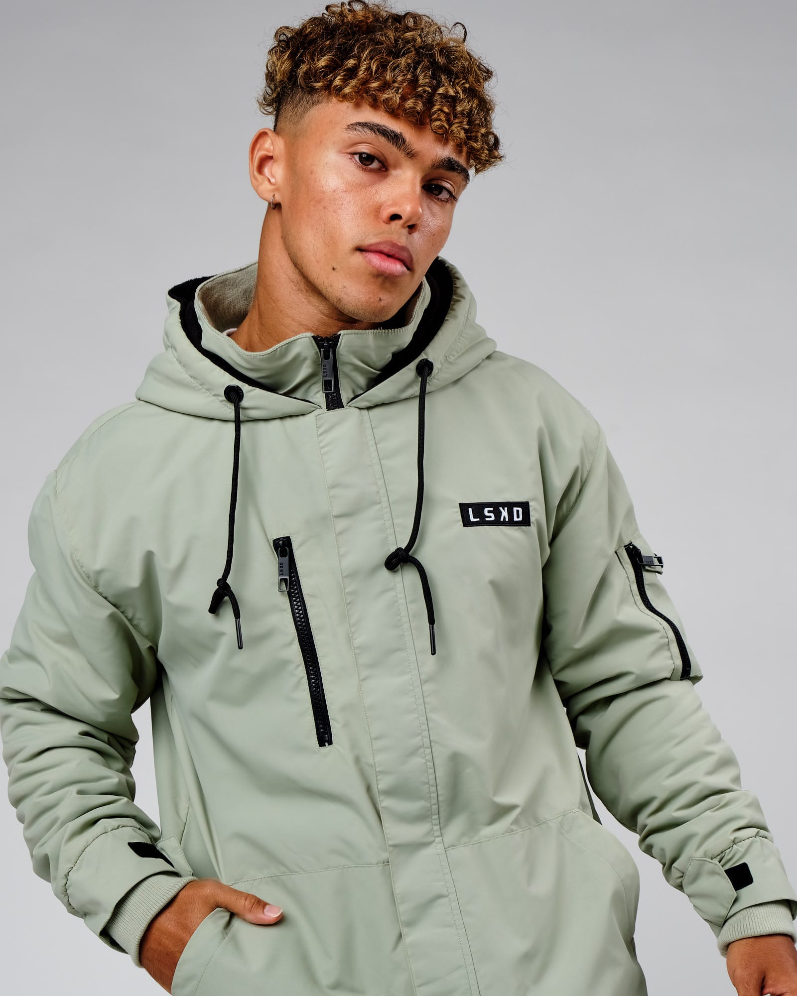 Model wearing Marshall Jacket - Desert Sage