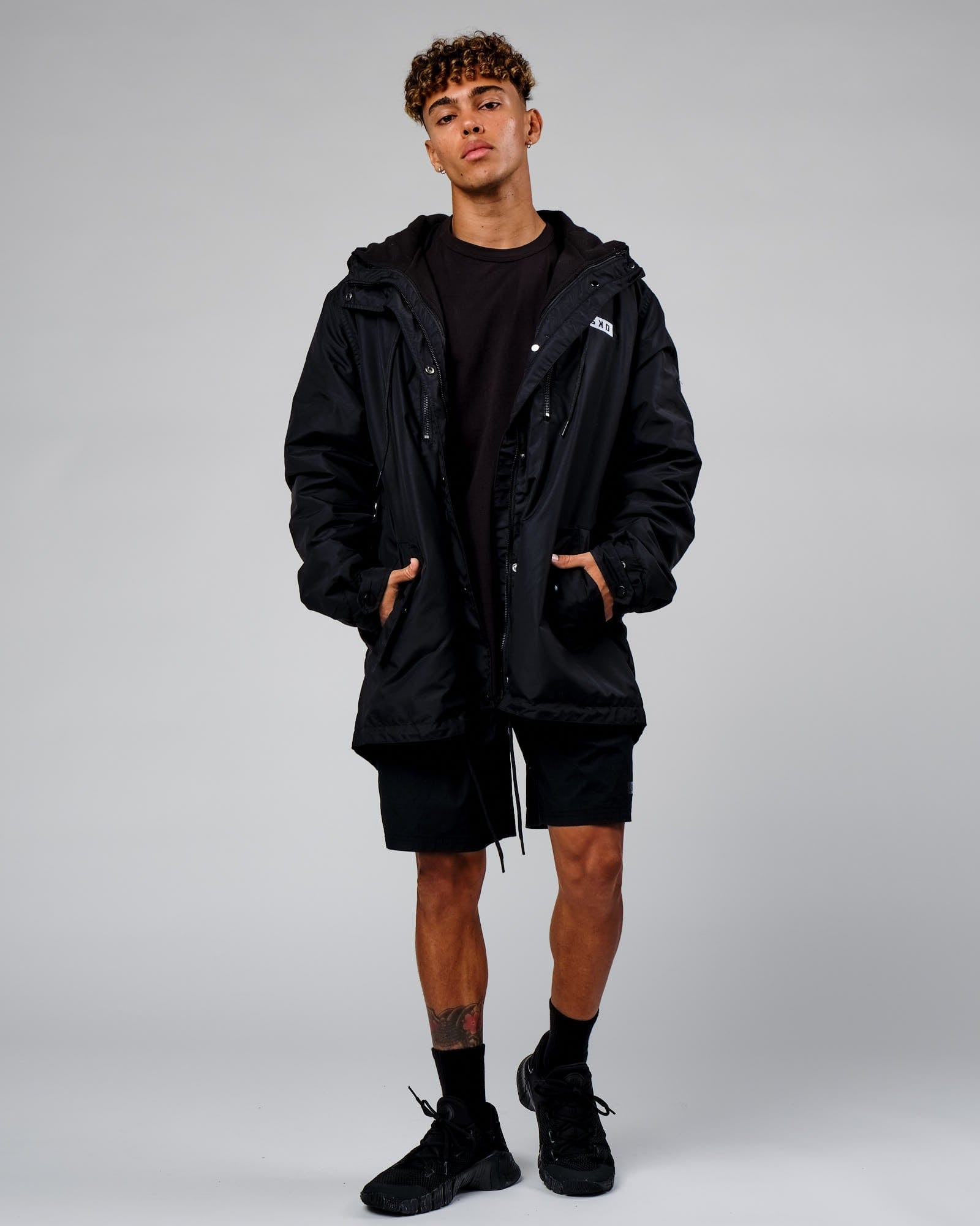 Model wearing Tack Anorak Jacket - Black
