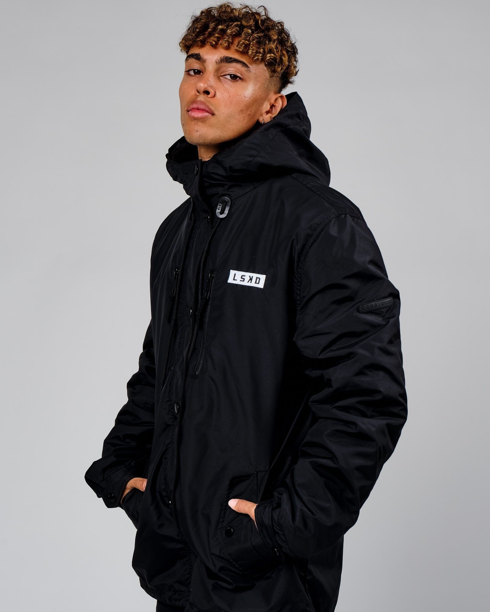 Model wearing Tack Anorak Jacket - Black