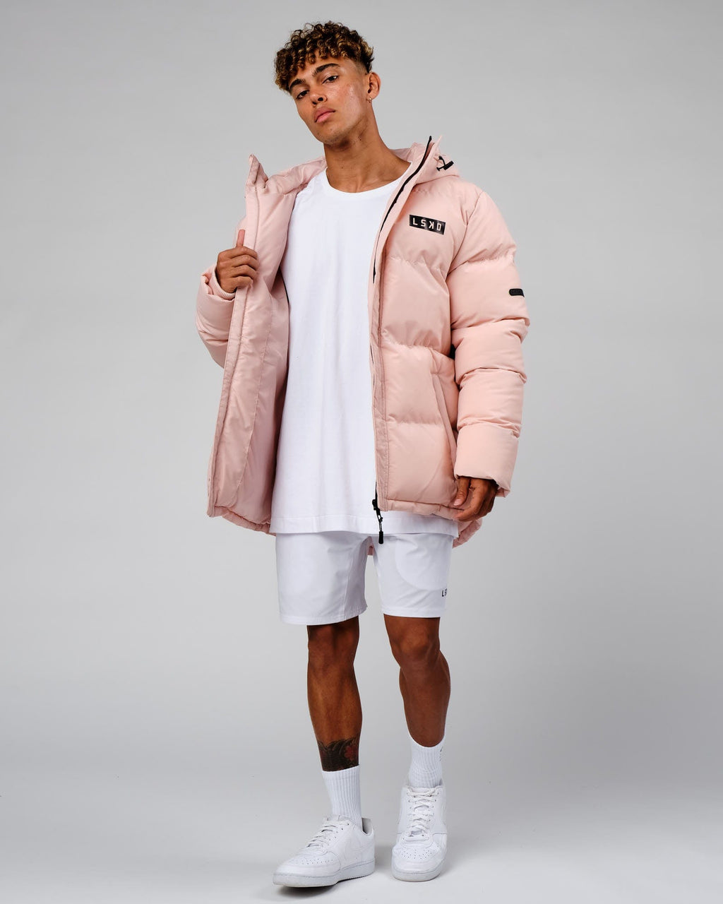 Model wearing Roasted Puffer Jacket Oversize 22 - Peach Whip