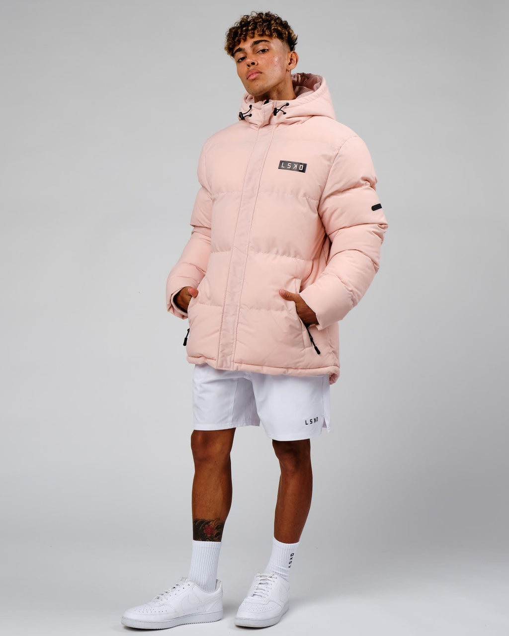 Model wearing Roasted Puffer Jacket Oversize 22 - Peach Whip