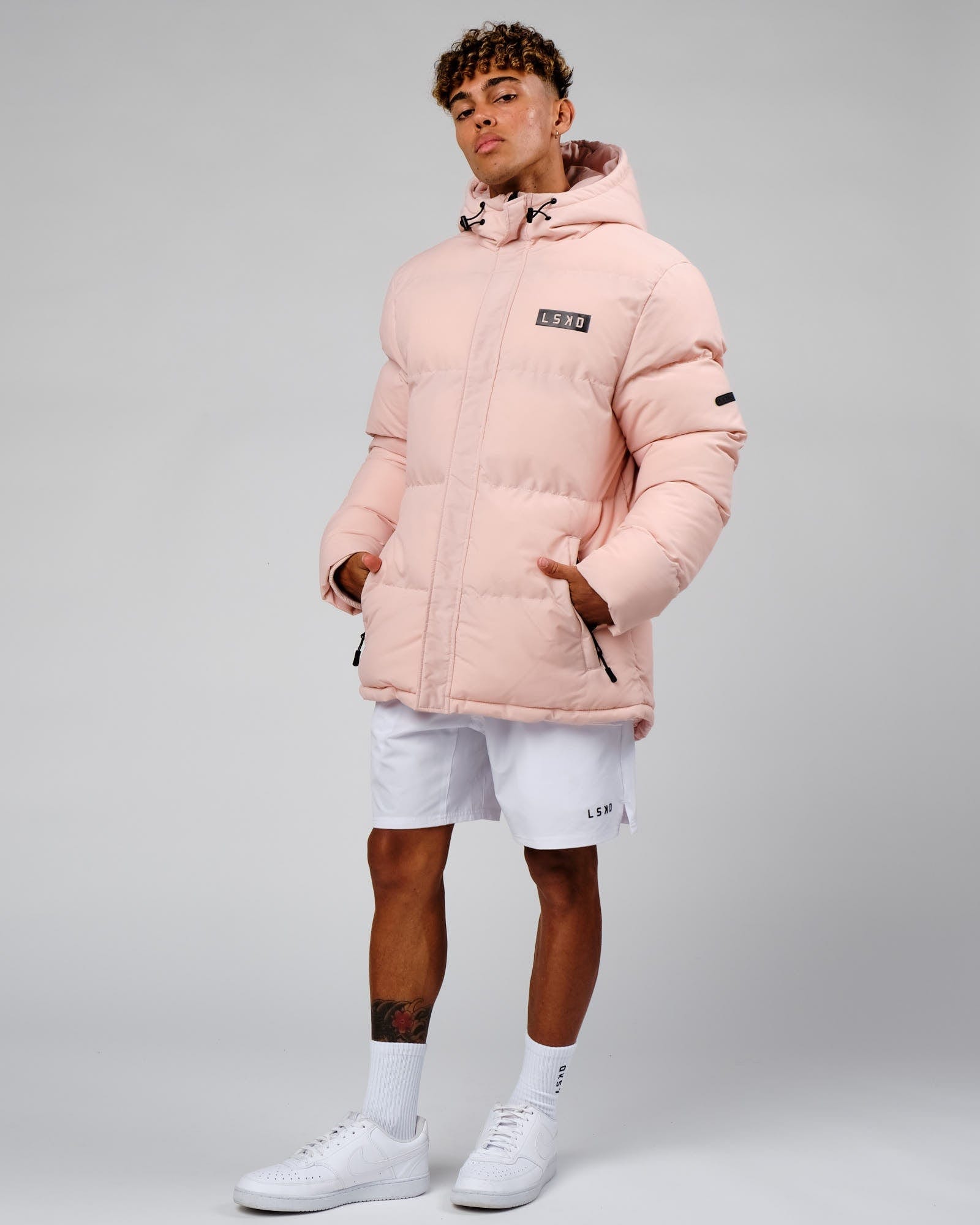 Model wearing Roasted Puffer Jacket Oversize 22 - Peach Whip