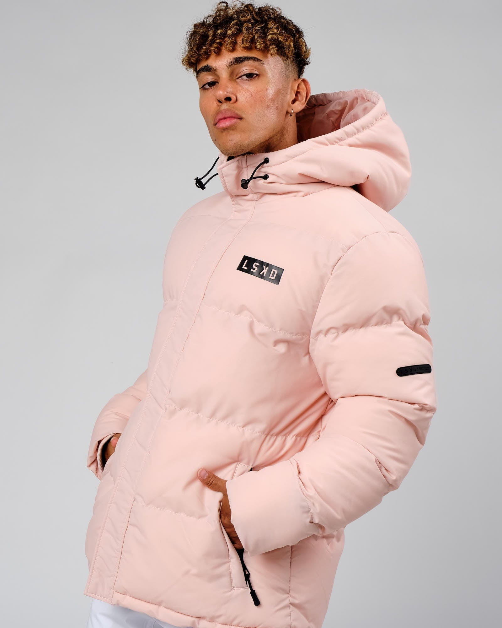Model wearing Roasted Puffer Jacket Oversize 22 - Peach Whip