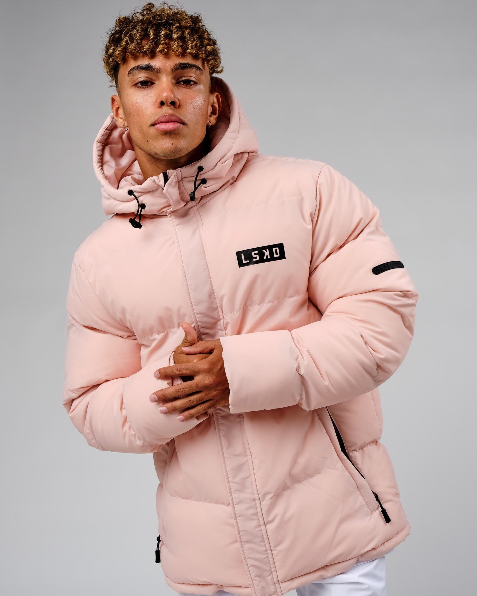 Model wearing Roasted Puffer Jacket Oversize 22 - Peach Whip