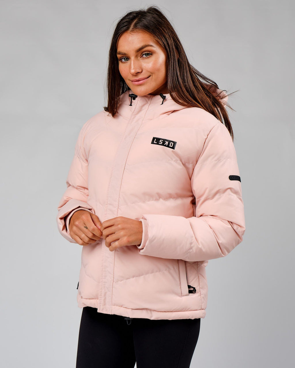 Model wearing Roasted Puffer Jacket 22 - Peach Whip