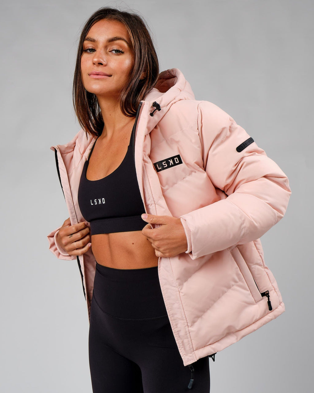 Model wearing Roasted Puffer Jacket 22 - Peach Whip