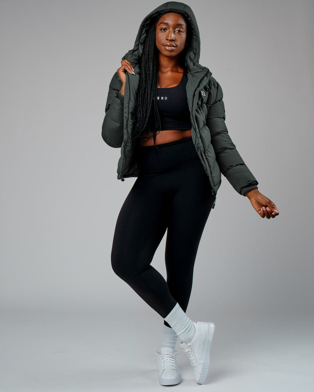 Model wearing Roasted Puffer Jacket 22 - Carbon Green