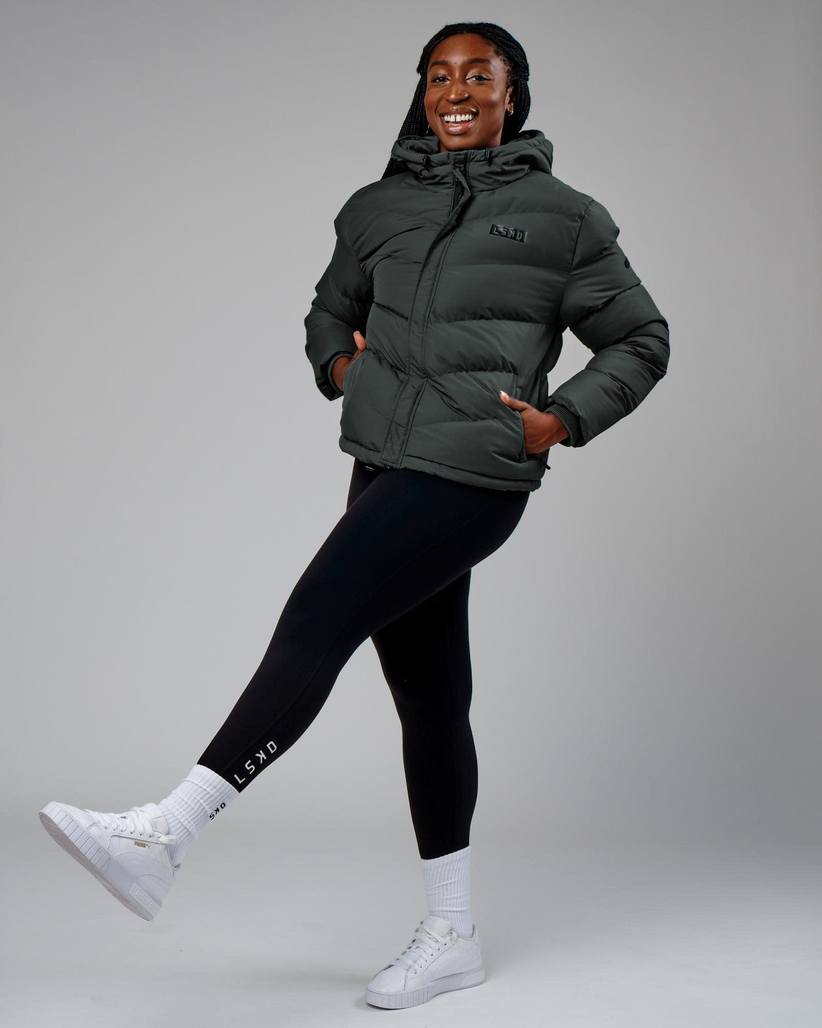 Model wearing Roasted Puffer Jacket 22 - Carbon Green