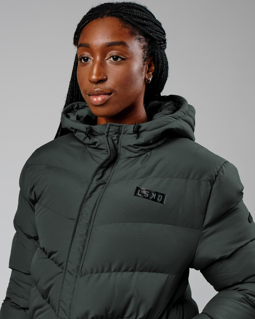 Model wearing Roasted Puffer Jacket 22 - Carbon Green