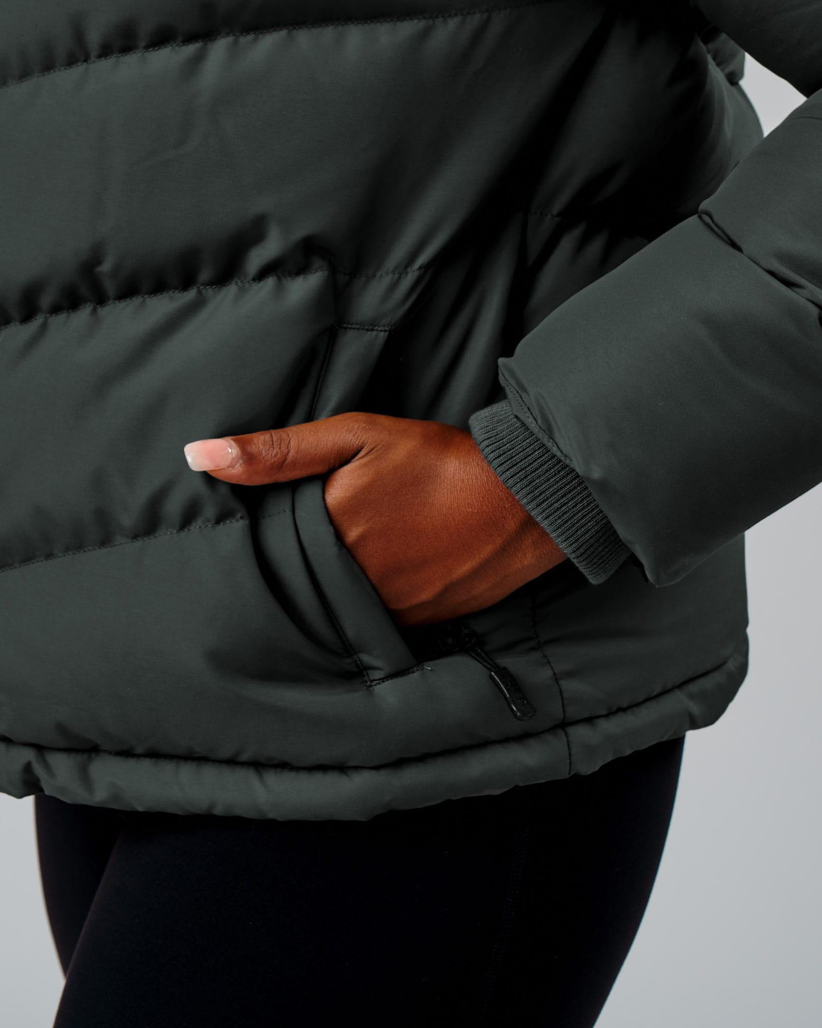 Model wearing Roasted Puffer Jacket 22 - Carbon Green