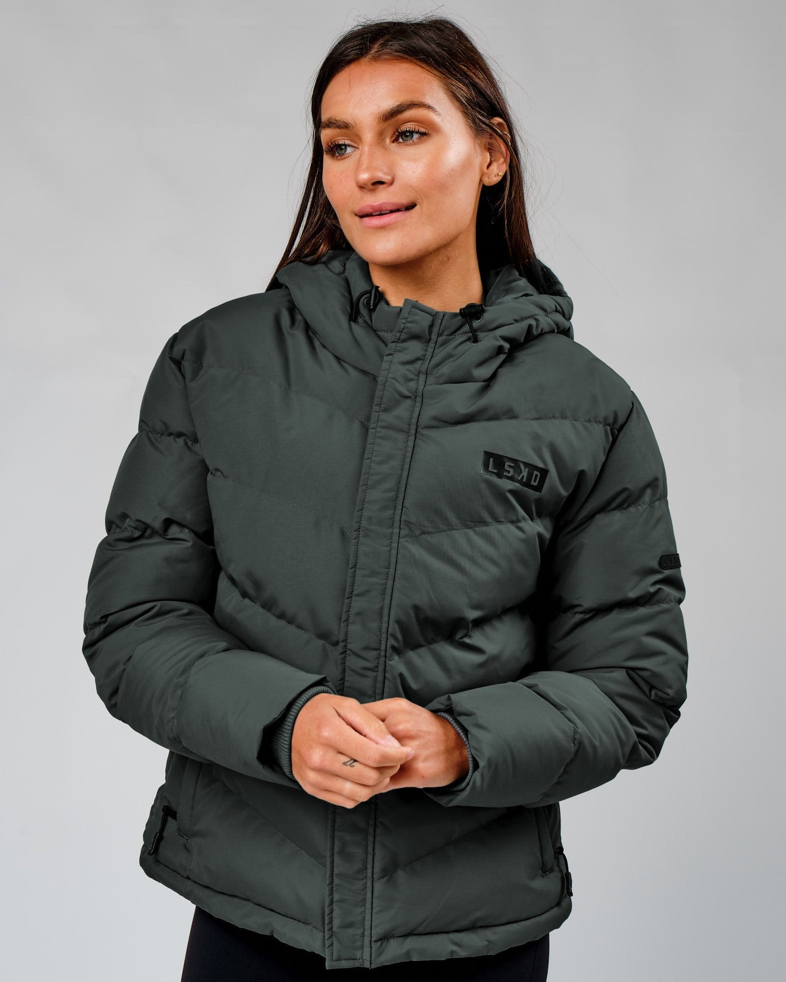 Model wearing Roasted Puffer Jacket 22 - Carbon Green