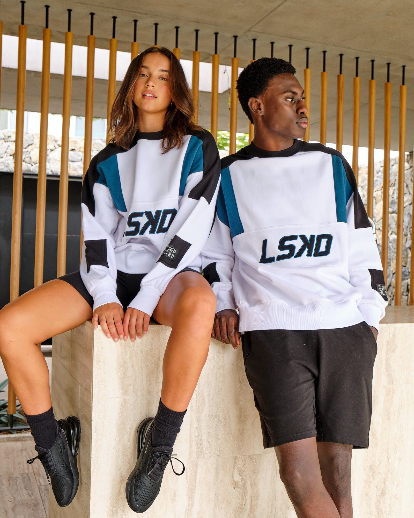 Model wearing Unisex Slam Sweater Oversize - White-Atlantic