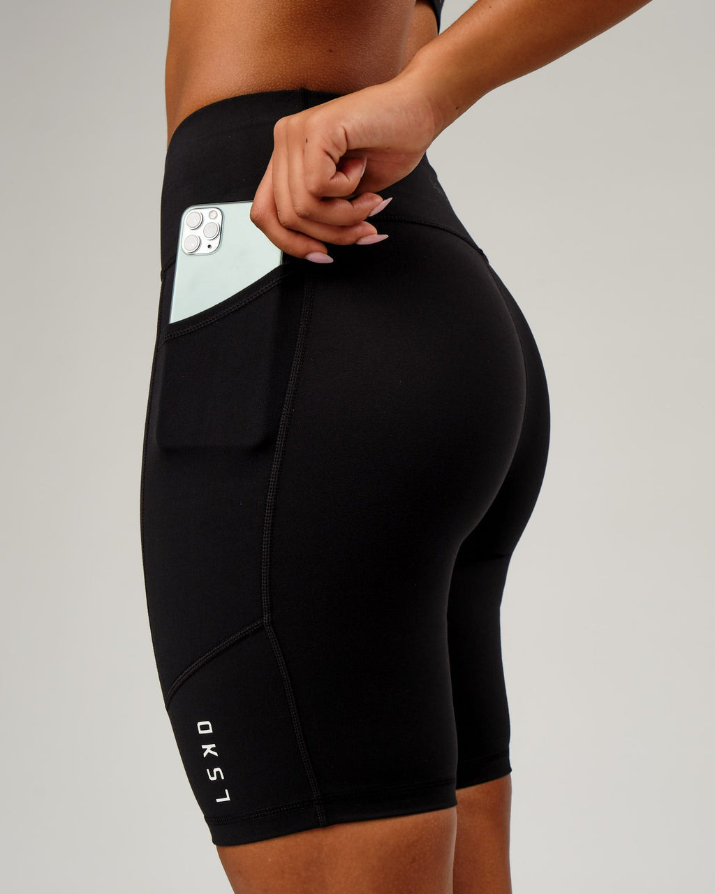 Model wearing Rep Short Tight Small Logo - Black