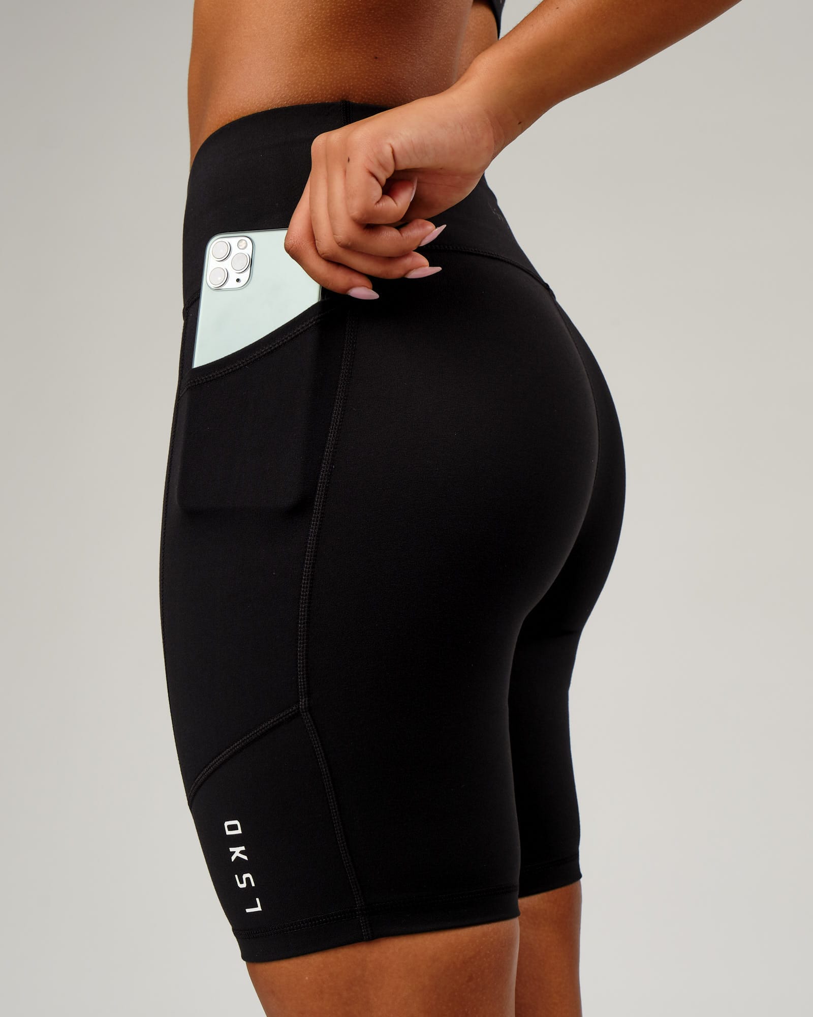 Model wearing Rep Short Tight Small Logo - Black