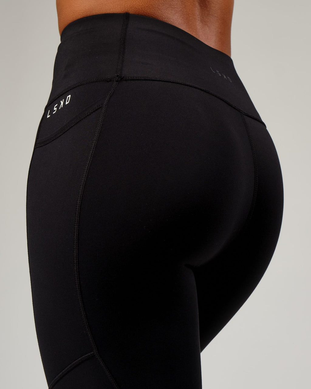 Model wearing Rep Full Length Tight Small Logo - Black-White