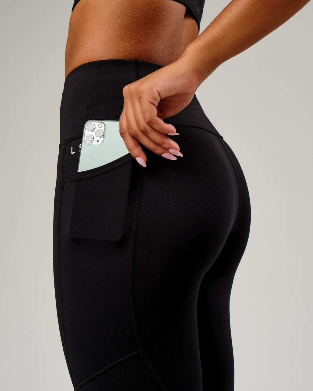 Model wearing Rep Full Length Tight Small Logo - Black-White