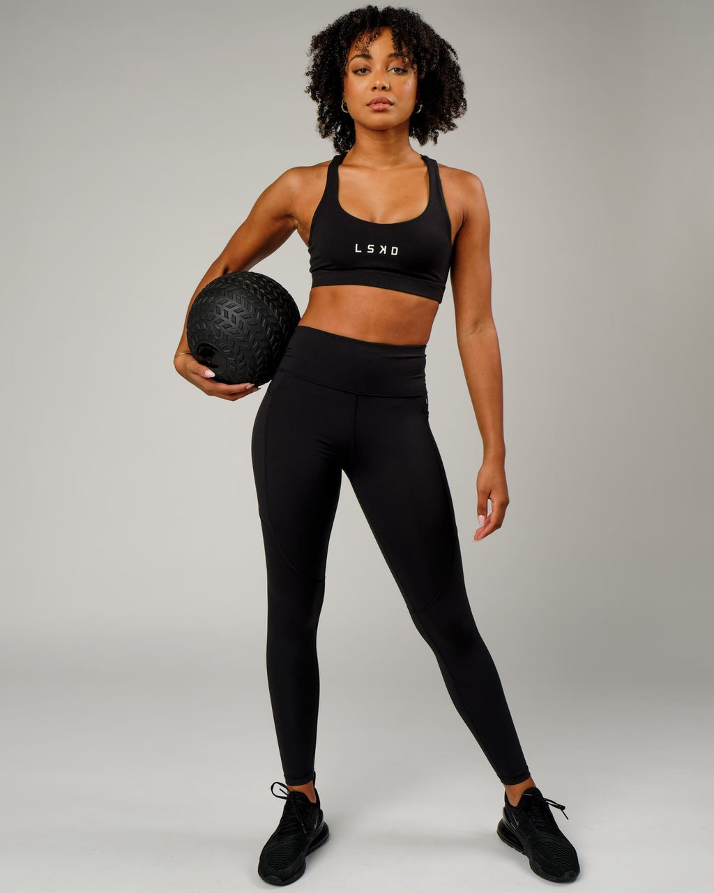 Model wearing Rep Full Length Tight Small Logo - Black-White