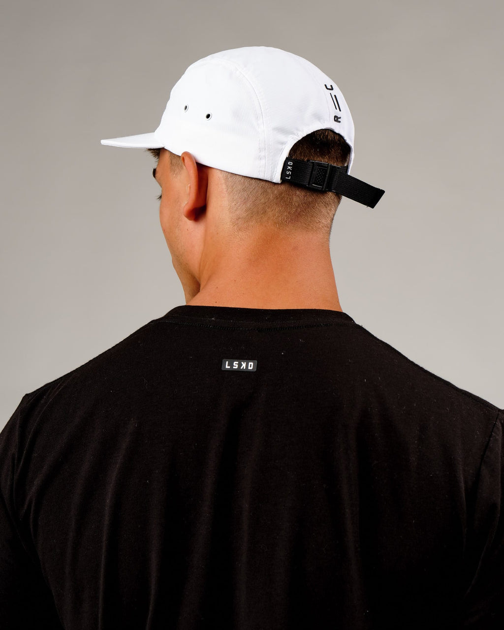 Model wearing Run Club Cap - White