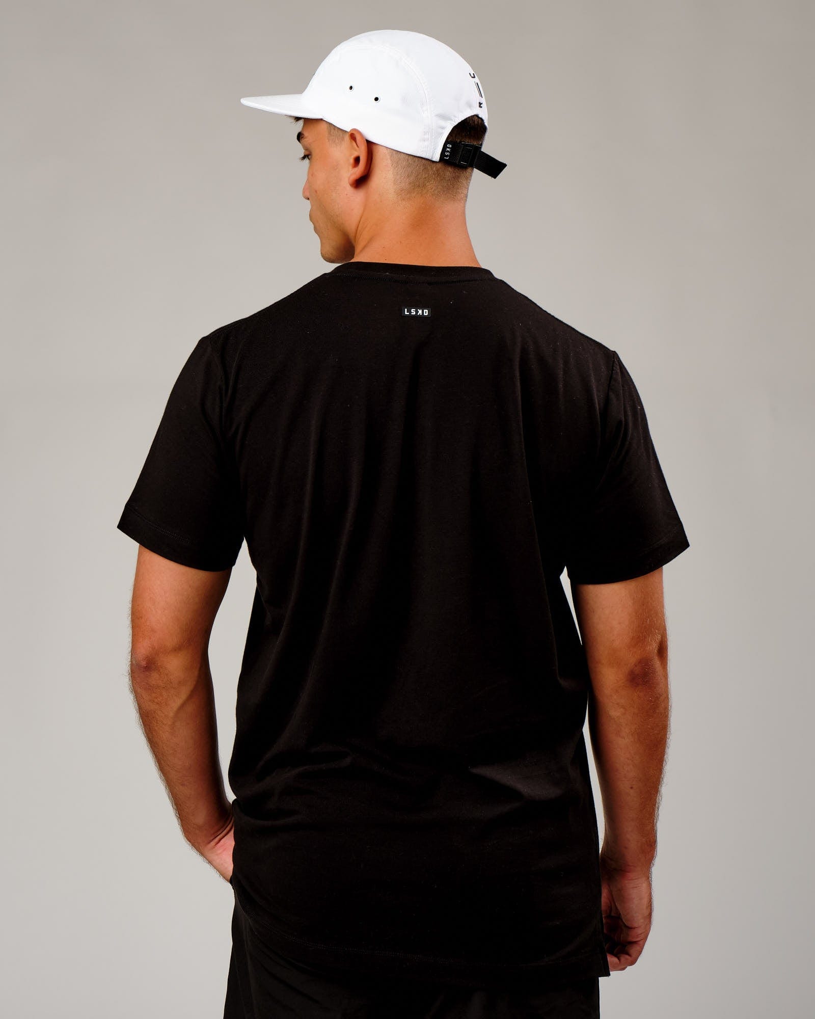 Model wearing Run Club Cap - White