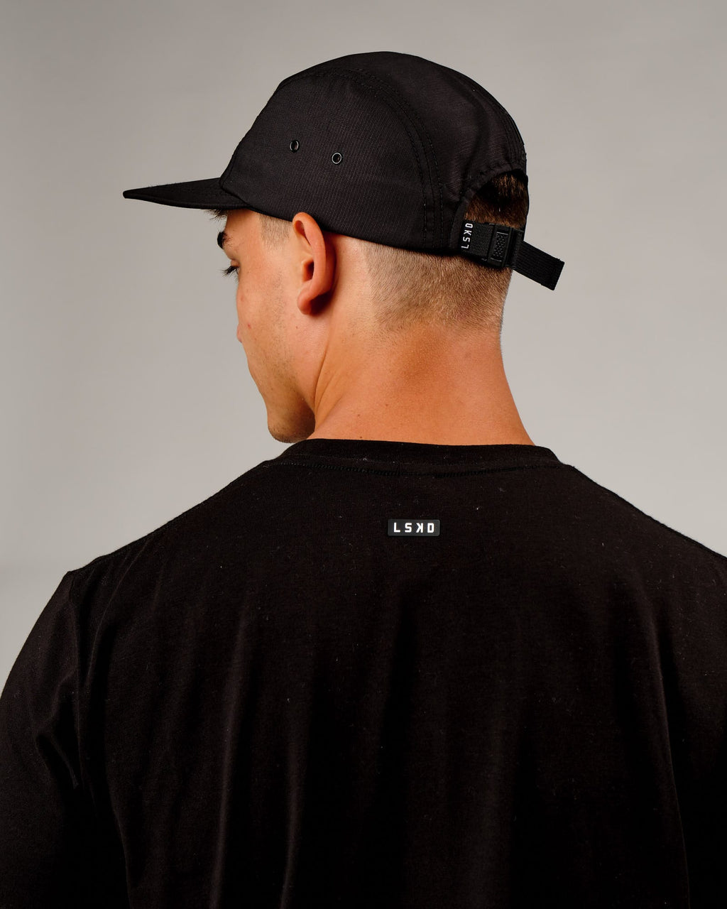 Model wearing Run Club Cap - Black
