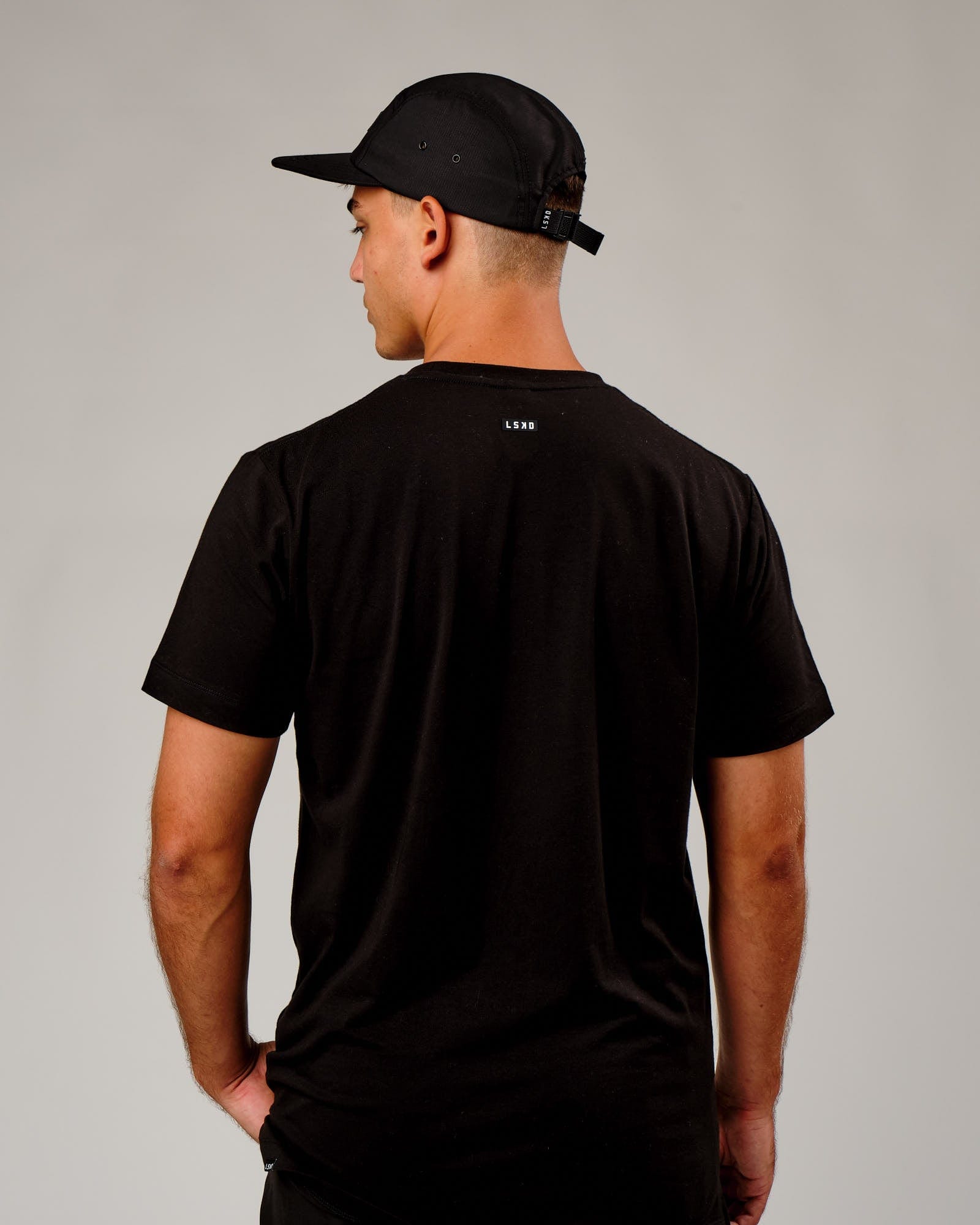 Model wearing Run Club Cap - Black