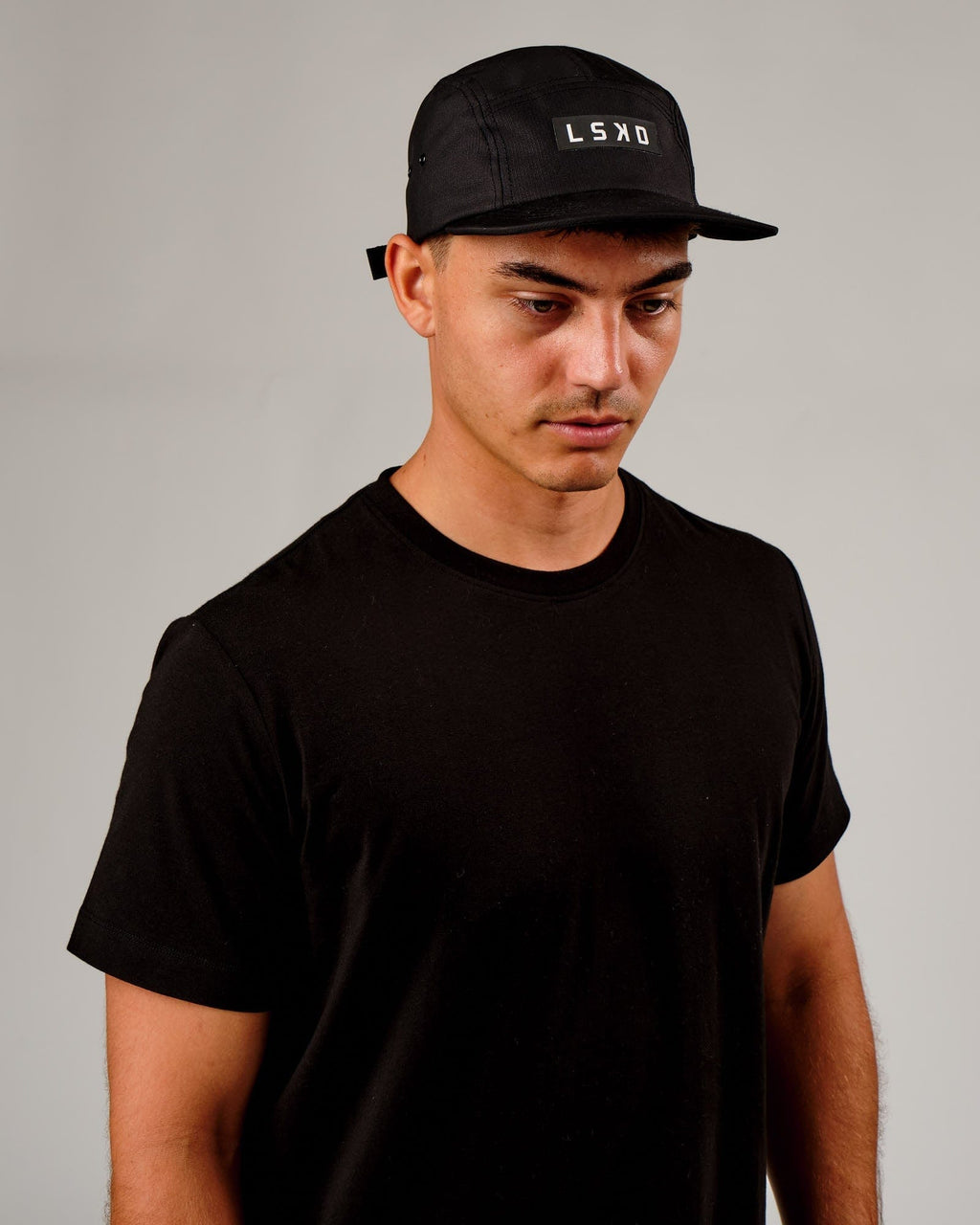 Model wearing Run Club Cap - Black