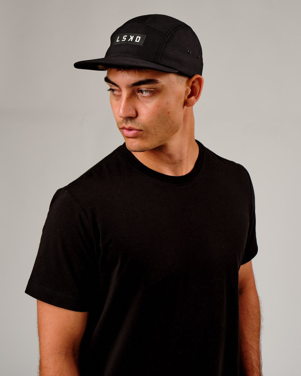 Model wearing Run Club Cap - Black