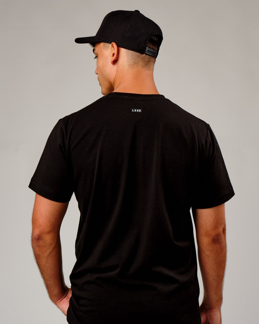 Model wearing Cornerstone Snapback Cap - Black-White