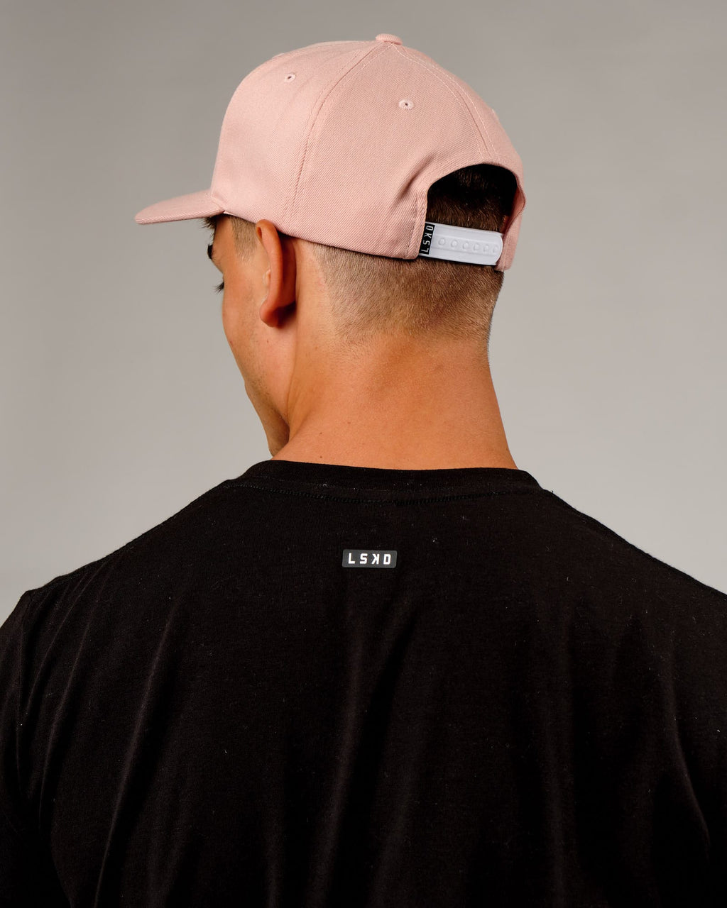 Model wearing Cornerstone Cap - Dusty Pink