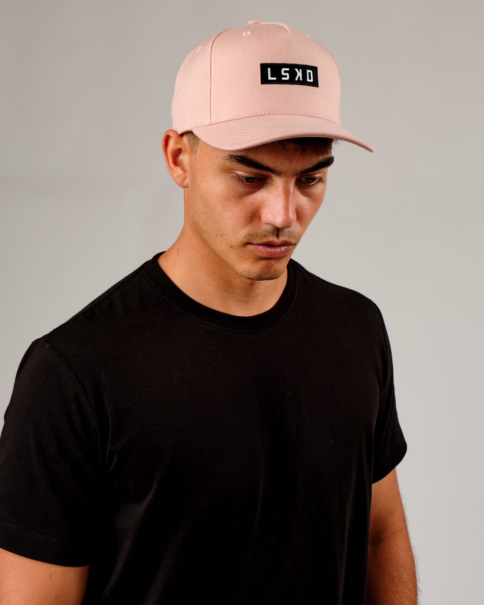 Model wearing Cornerstone Cap - Dusty Pink
