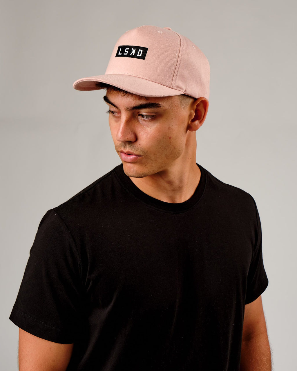 Model wearing Cornerstone Cap - Dusty Pink