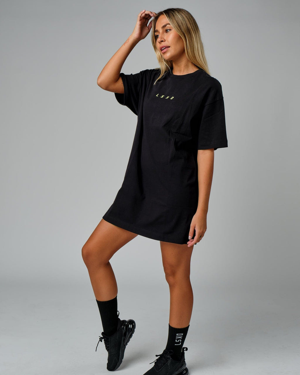 Model wearing Fixed Tee Dress - Black-Fluro Lime