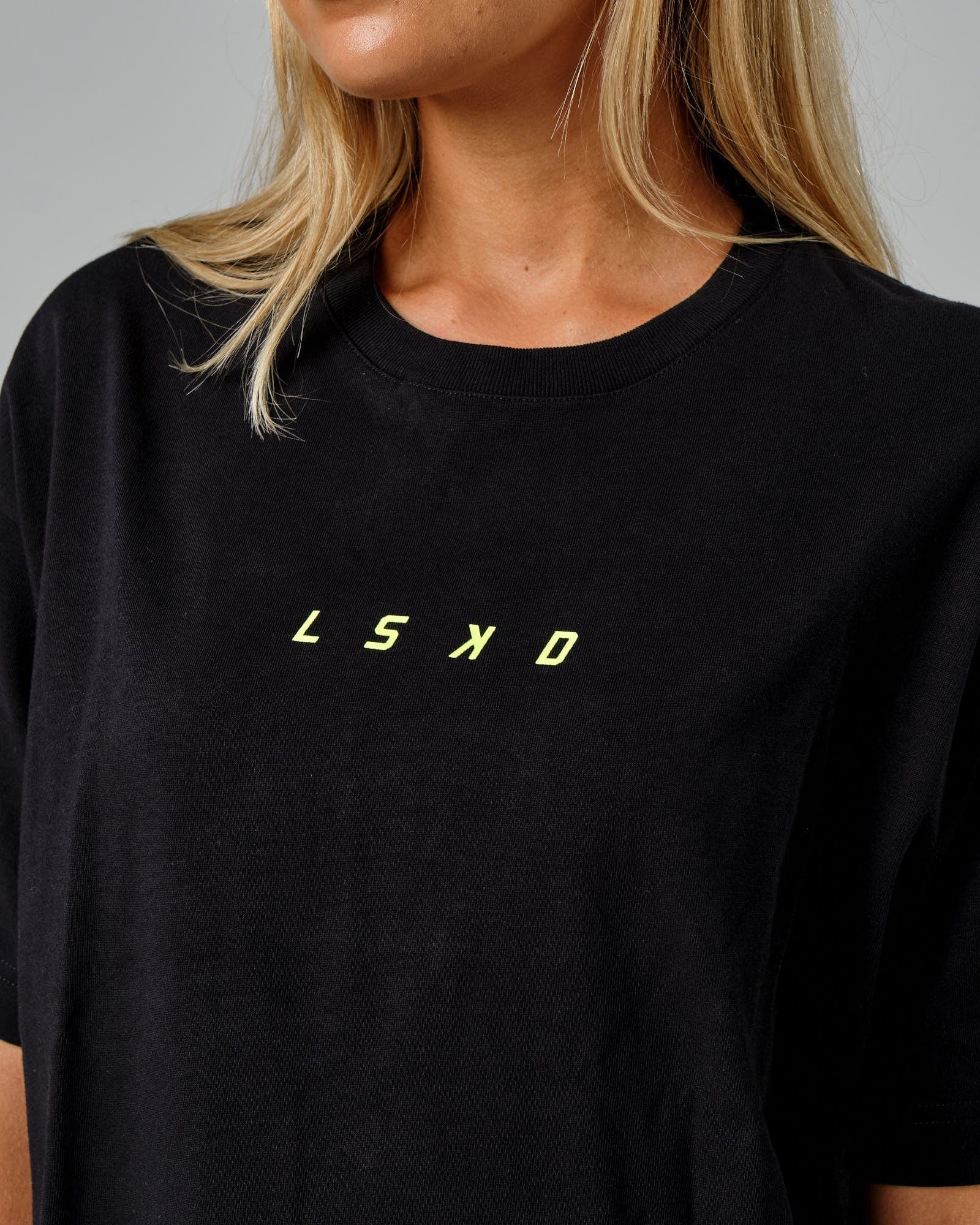 Model wearing Fixed Tee Dress - Black-Fluro Lime