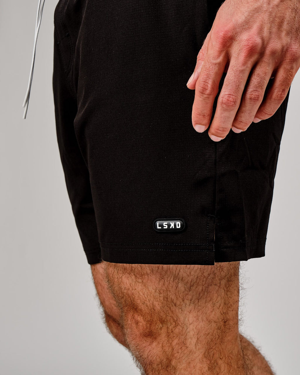 Model wearing Capsule 7" Performance Short - Black