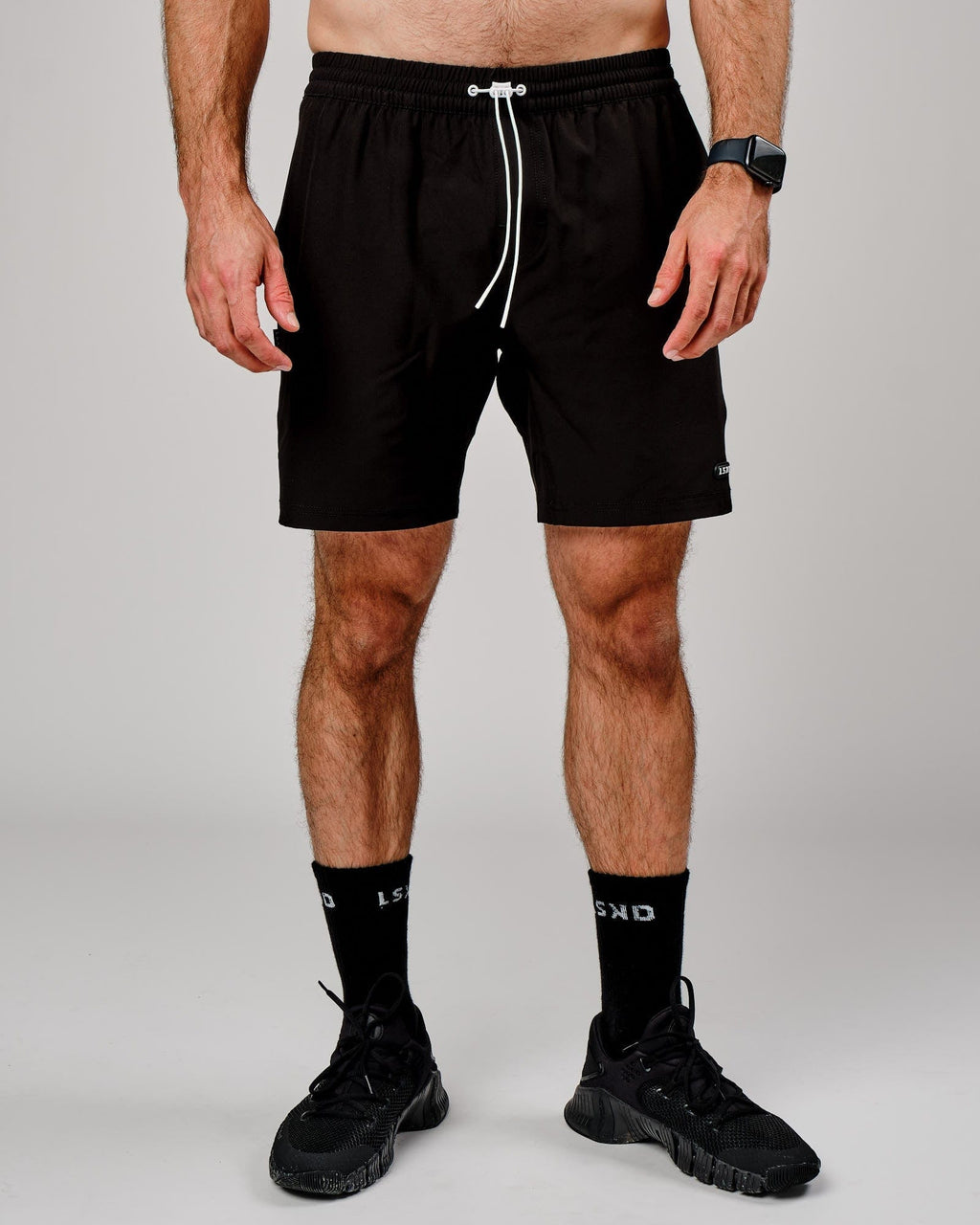 Model wearing Capsule 7" Performance Short - Black