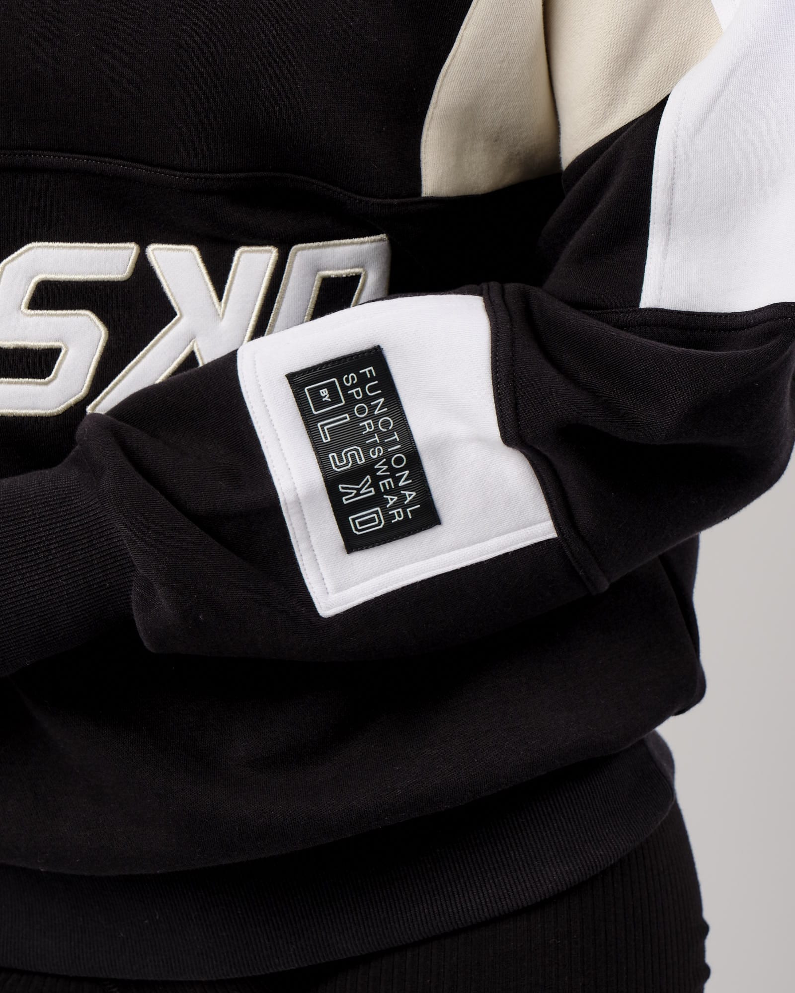 Model wearing Unisex Slam Oversize Sweater - Black-Bone