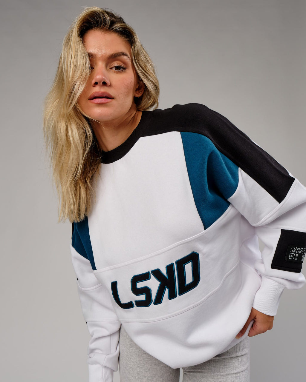 Model wearing Unisex Slam Sweater Oversize - White-Atlantic